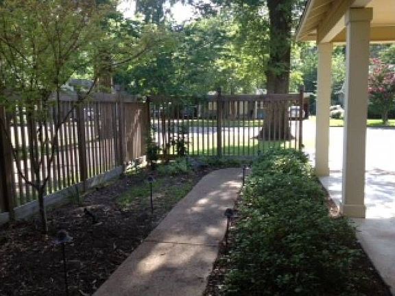 secluded lit entry path