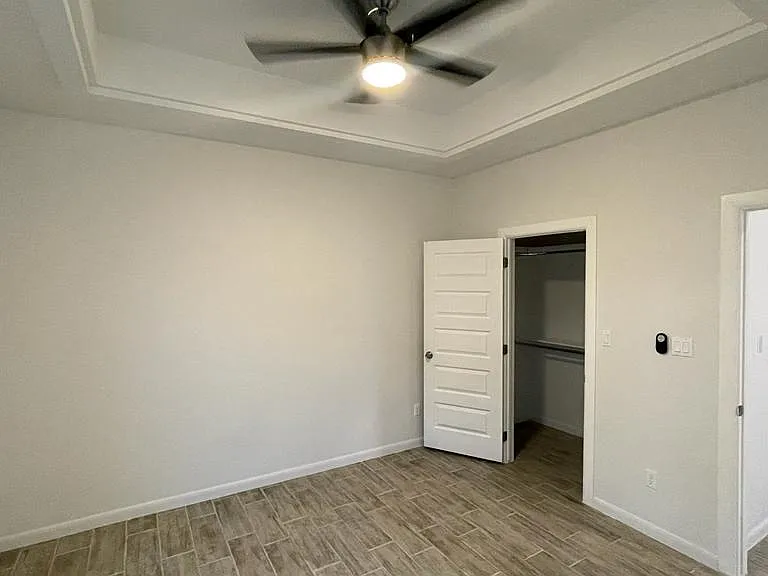 Bedroom one walk in closet and fans in all units with remotes
