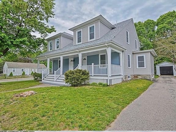 Tree in front yard has been removed; parking structures for both units have been removed.