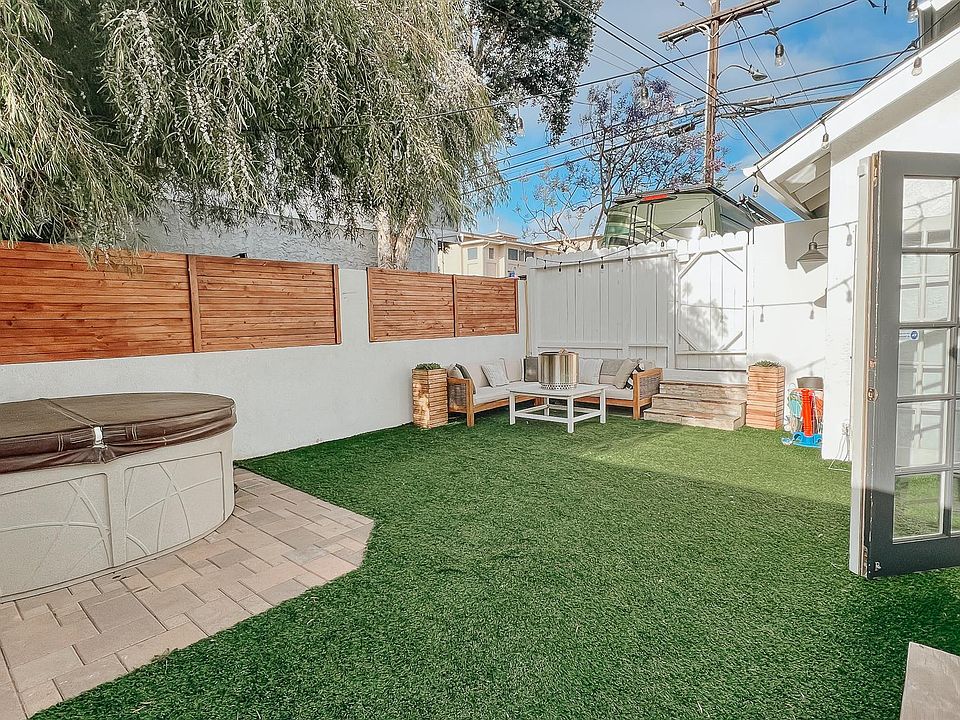 Backyard opens to kitchen