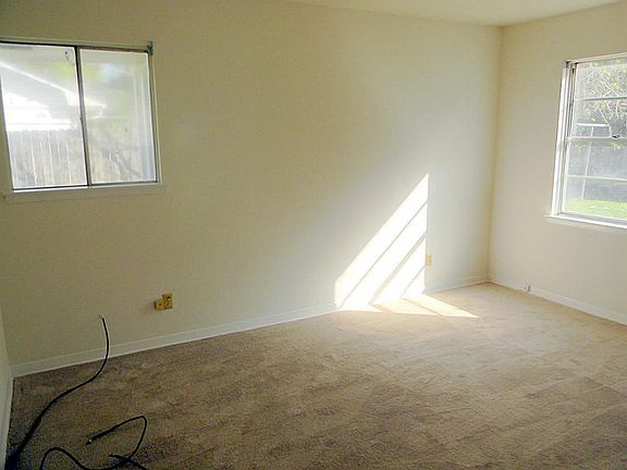 Master bedroom has great space and clean, neutral paint & carpet.