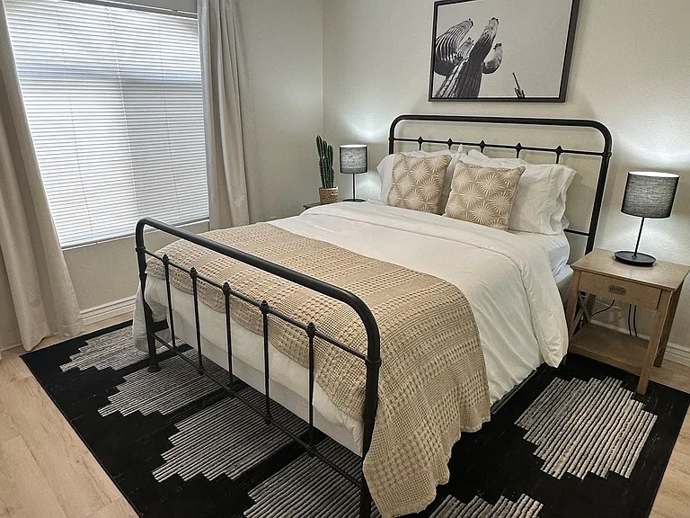 BEDROOM - Black-out curtains, walk-in closet, ceiling fan