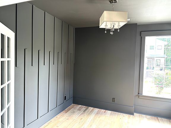 The accent wall is such a focal point of this room.