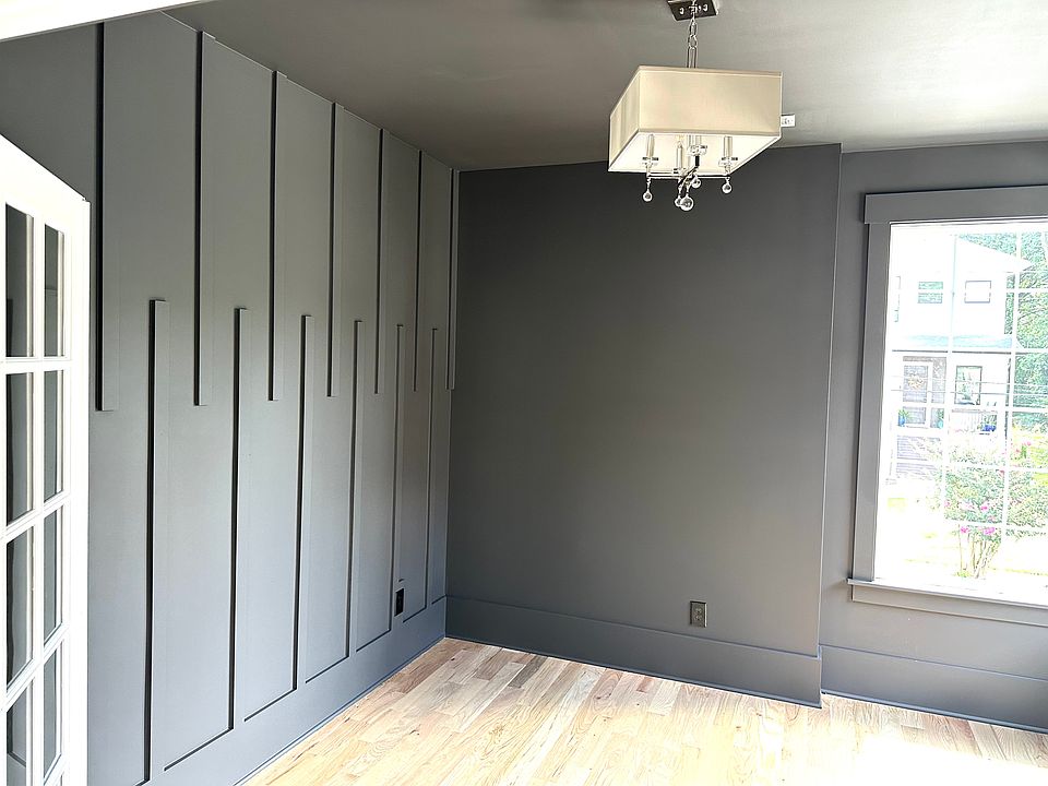 The accent wall is such a focal point of this room.