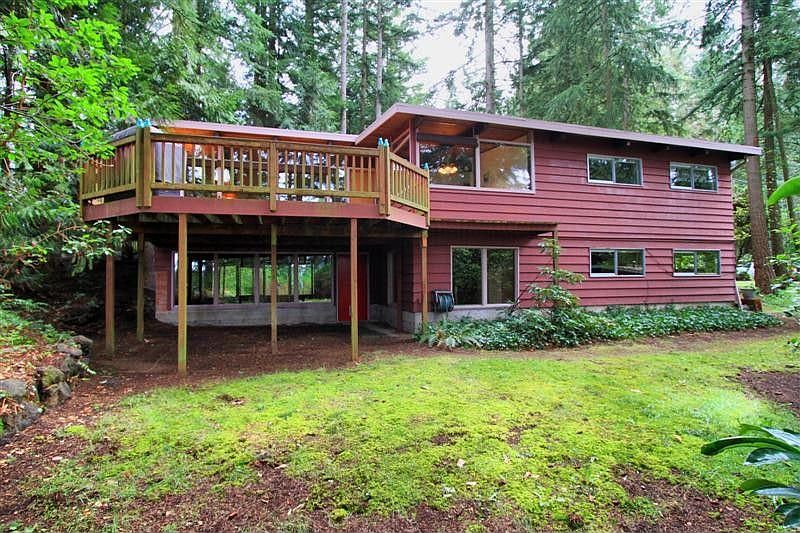Rear view of 19559 38th Ave. NE in Lake Forest Park, Nestled in nature !