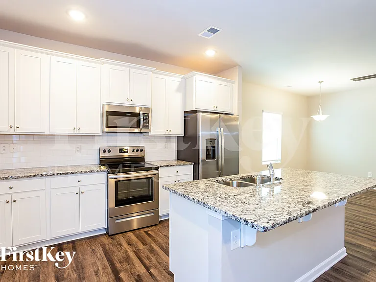 10724 Rivergate Dr NW — Photo 8