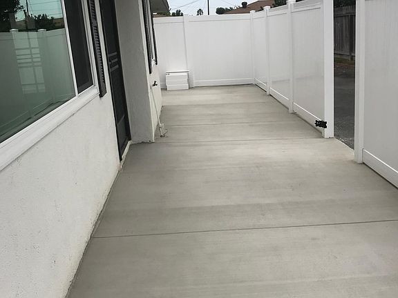 fenced front patio-side patio not pictured