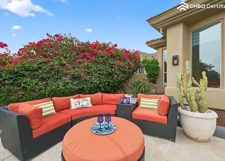 Mointain view seating hidden by lush bougainvillea