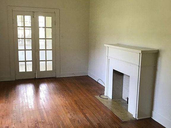 Living area looking to either a sunroom or office