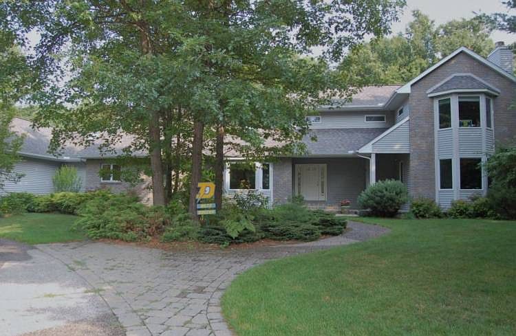 Magnificent contemporary home with the architectual design and the quality of construction by Bill Philips.  With the serenity and privacy of a unique setting backing up to City Forest you will enjoy this 5 bedroom, 3.5 baths home with plenty of natural light throughtout the home.  Stunning view of the private backyard from the two story foyer.  With all of the amenities that a family would want including a gourmet kitchen with custom cabinets, walk-in panty and a butler pantry.   Audio system throughout most of the home, world class media and entermainment room, and 3 fireplaces are some of the out standing features found in this home. The main floor master suite has heated flooring in the  master bath.  A spacious heated garage with direct access to the basement. Back up generator, main floor laundry with drying racks are added features that you will enjoy.  You must see this home to appreciate all that it has to offer. 