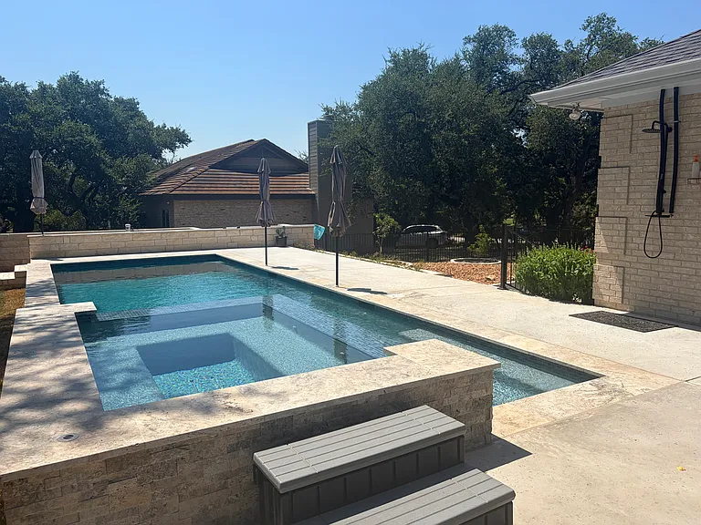 view of the pool and spa