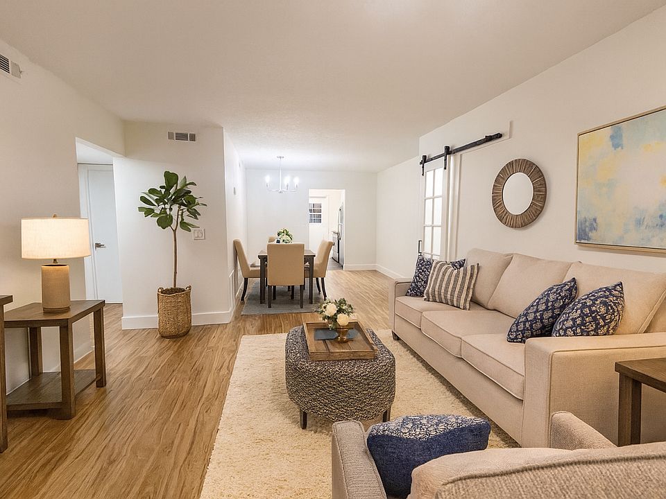 Living room with AI furnishing ideas, also see dining area