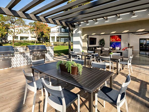 Poolside Dining with Bar Seating and Gas Grills