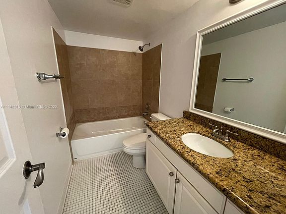5th image of 504 Gardens Dr APT 103