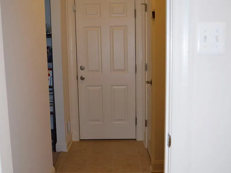 Hallway to attached garage