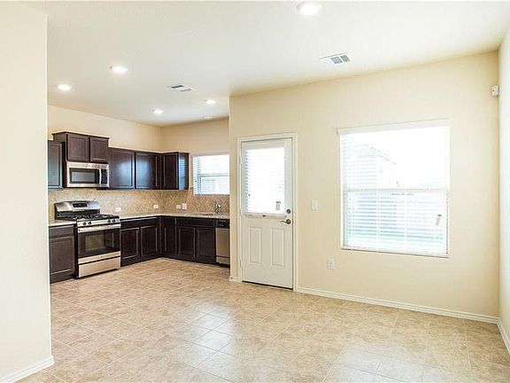 Kitchen. Includes Refrigerator