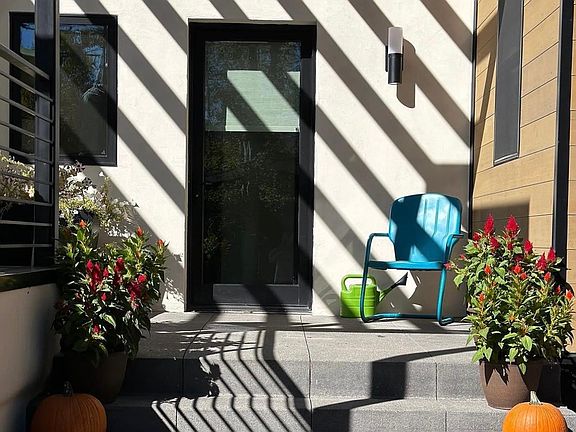 Entry with side deck for summer enjoyment.