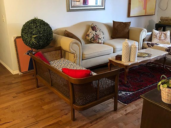 Large, bright Living Room with wood floors