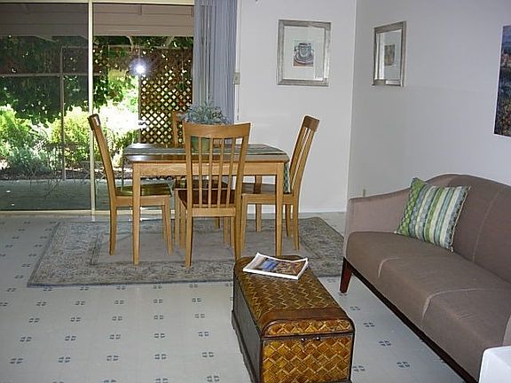 Family room with view of lovely kiwi arbor