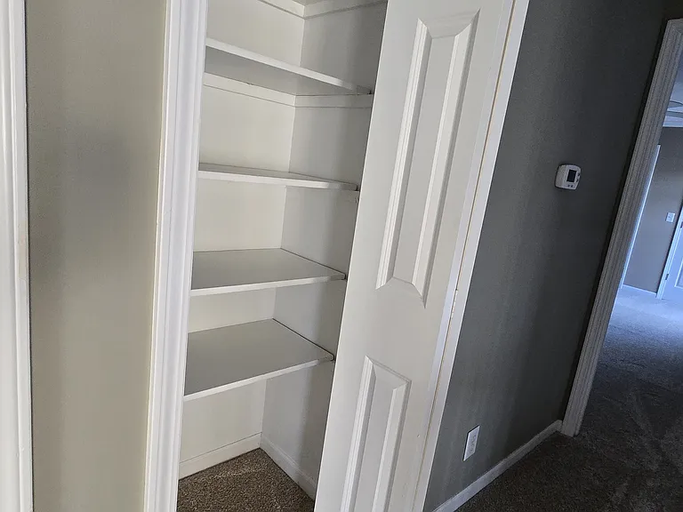 linen closet in the hallway