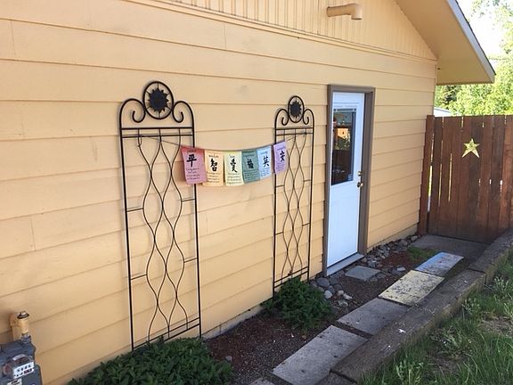 Side entry to garage-yard