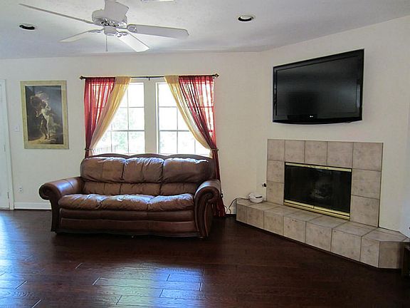 Fireplace with tile surround.