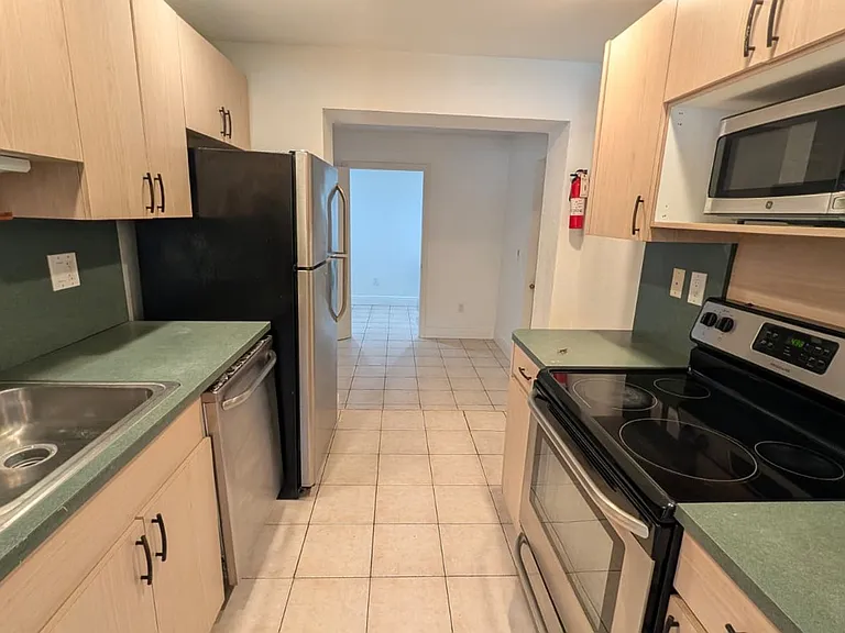 1448 NE 27th Ct — Photo 8