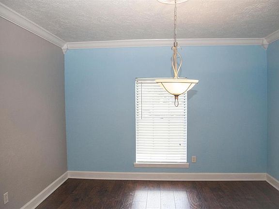 This view is from the doorway between the kitchen and dining room.