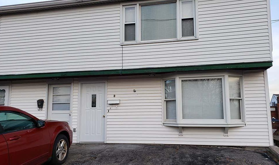 Off street parking front door front bay window.