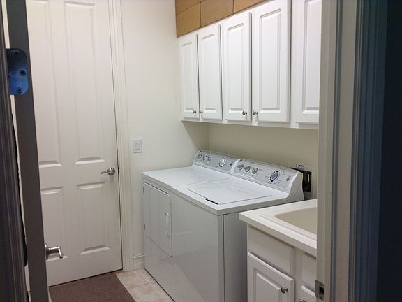 cabinets and utility sink 