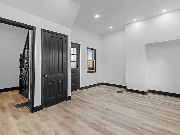 Living Area and hallway to stairs