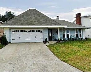 large driveway with direct access to biking and walking trail