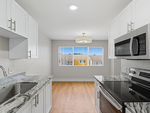 Separate dining room space adjacent to the kitchen
