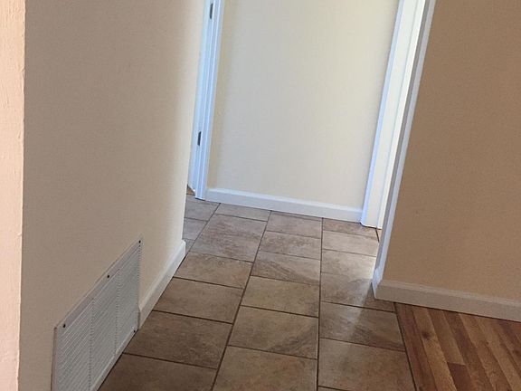 Hallway from living room to bedrooms and bathroom