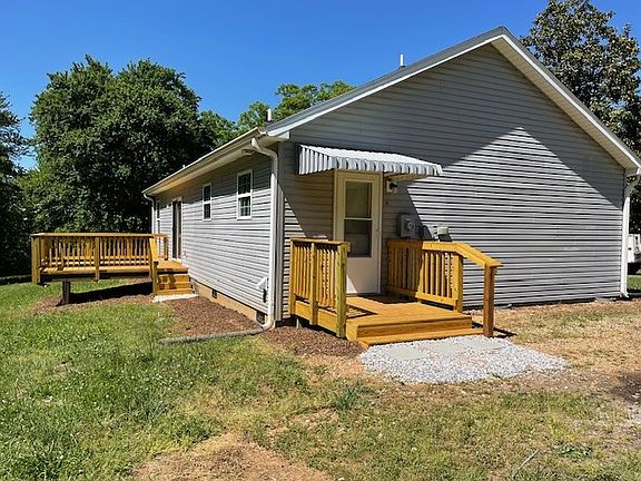 Left-side view of home with side-entry.