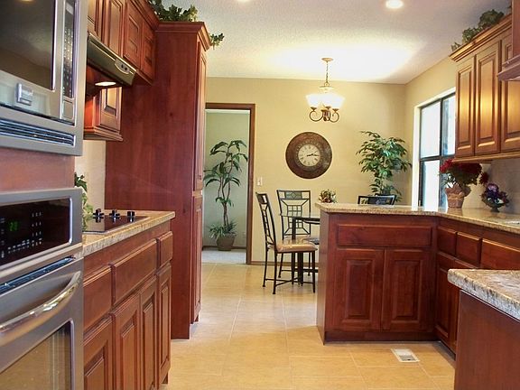 Remodeled kitchen, with new 16" travertine tiled flooring