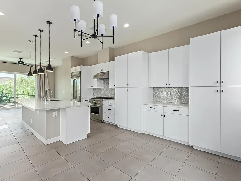 Huge kitchen with luxury appliances and gas stove