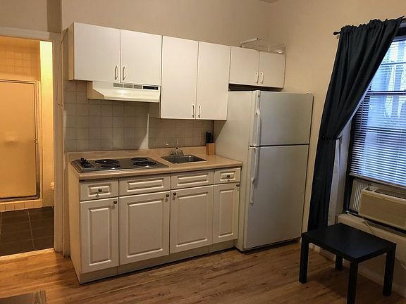 5th image of 400 W 50th St APT 1