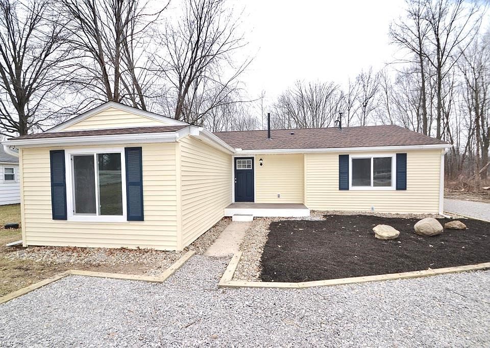 NEW Roof, Siding, and Gravel Driveway!
