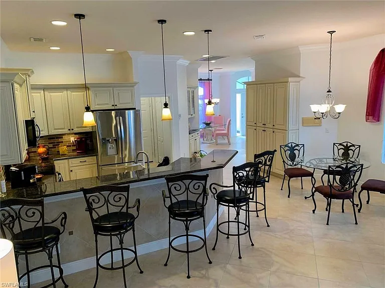 8906 Lely Island Cir — Photo 19