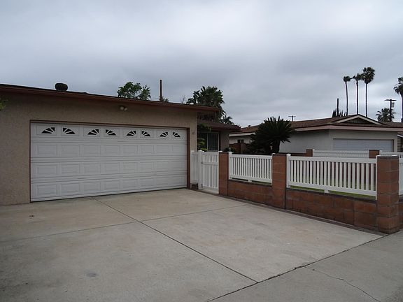 Front of House - Driveway/Garage Door