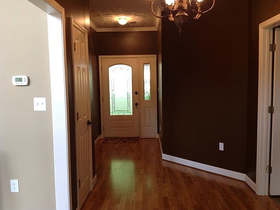 Foyer with Coat Close
						:
						Deep with picture window to back screen porch
