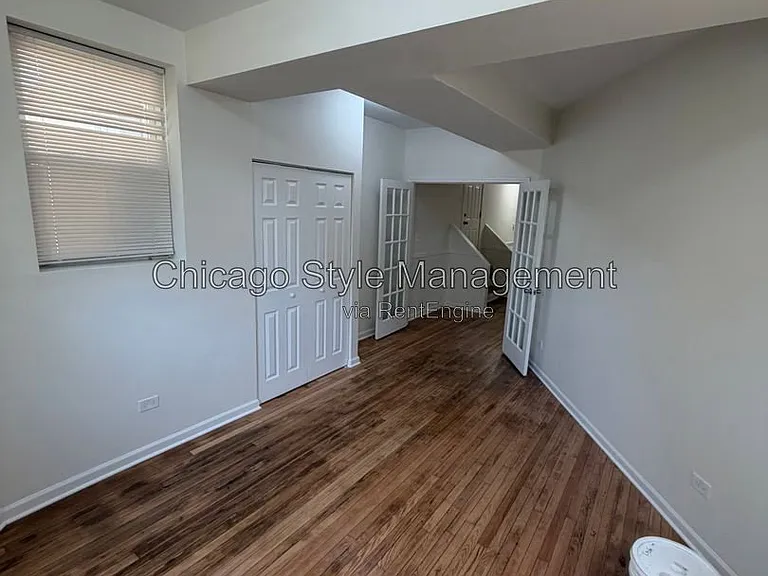 7833 S Colfax Ave — Photo 4