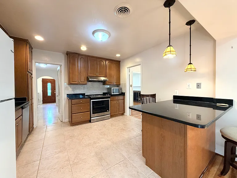 7529 Cayuga Ave — Photo 14