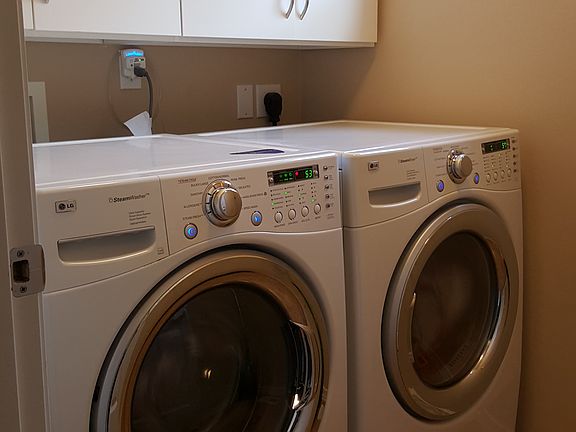 Laundry w/ custom cabinets