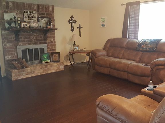 Living room area with beautiful real hard wood floors!