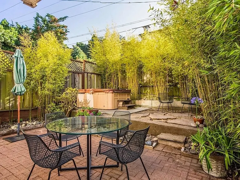 Bamboo garden on two levels with jacuzzi and room for entertaining.