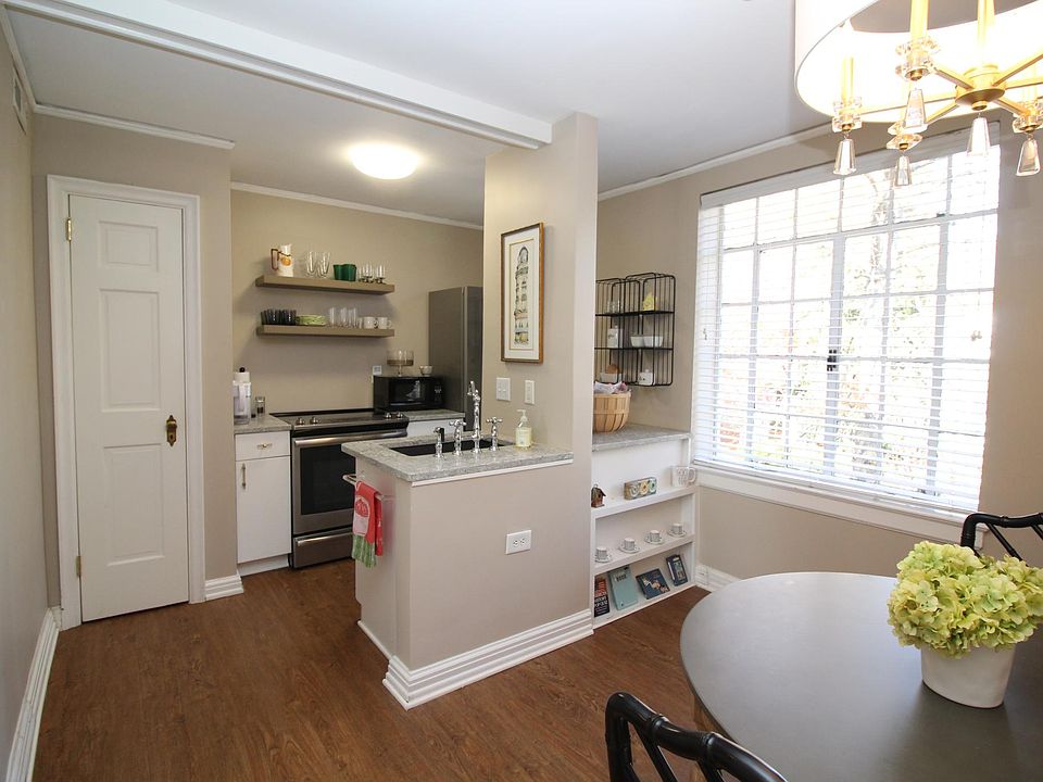 kitchen with eat in area and large window