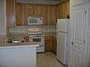 Kitchen has upgrade cabinets & pantry