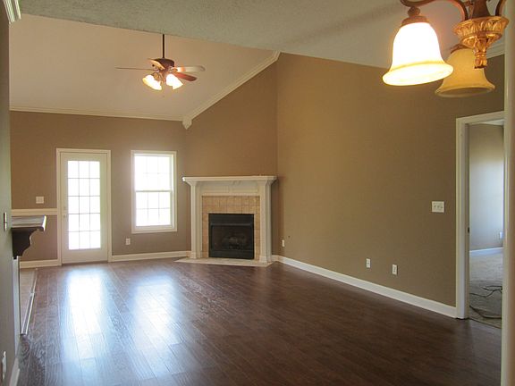 Large open floor plan with hardwood laminate floors